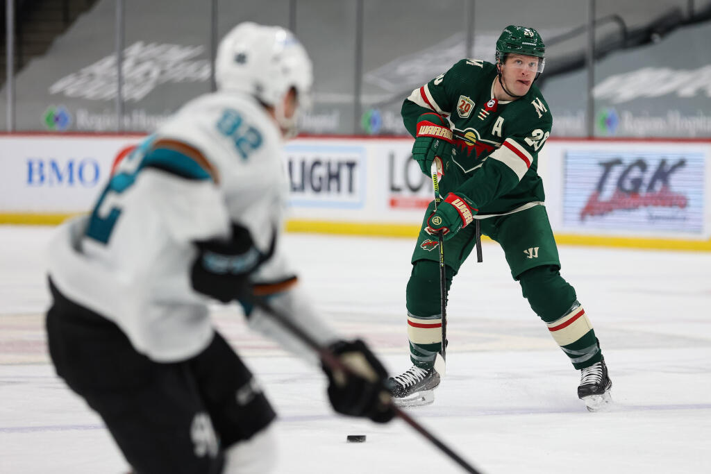 Minnesota Wild defender Ryan Suter (20) passes the puck during the second period against the San Jose Sharks at Xcel Energy Center.